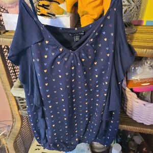 Ruffled adjustable strap tank.